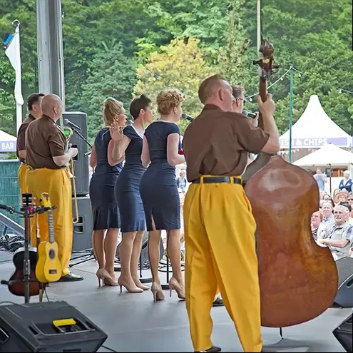 The Jive Aces performing on stage at the Chelsea flower show